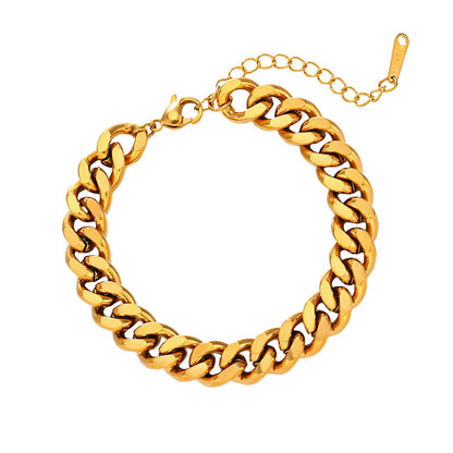 A gold-pvd stainless steel Cuban chain bracelet with a length of 17+5 cm and a width of 0.9 cm.